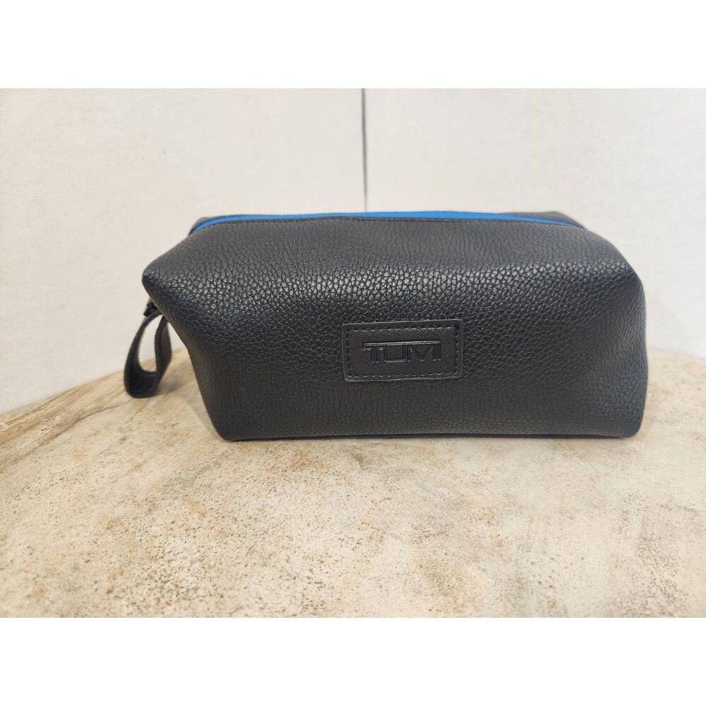 TUMI Black Toiletry Bag for Men with Blue Zipper and Top Handle